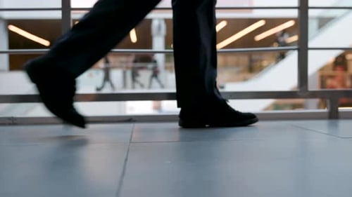 Office managers and businesspeople walking to work in urban city center