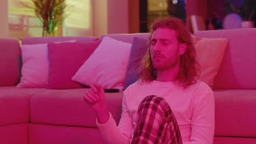 Excited Handsome Hipster Man Using Smart Future Technology TV Watching Online Shows on Transparent