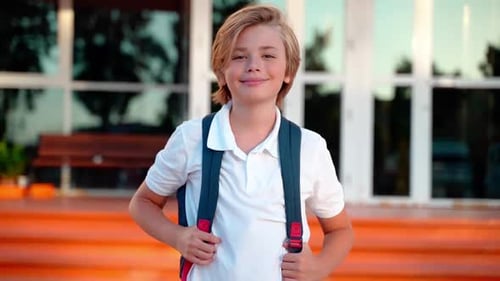 Portrait of Middle School Preteen Student Child Boy Girl with Backpack Looking at Camera Smiling in