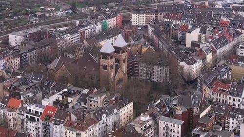 Tracking Shot of a Saint Michael Catholic Church in Bruesseler Platz in Downtown Cologne in a Cloudy