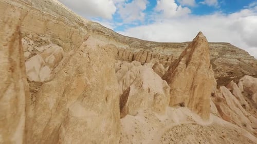 FPV Flight Over The Fairy Chimneys, Hoodoo Rock Formation In Cappadocia, Turkey. - aerial FPV