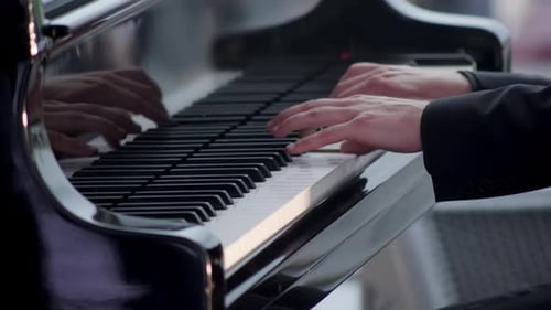 Close Up of Piano Player Performing Music