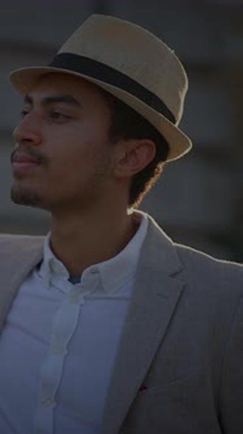 Young Adult Stylishly Posing During Golden Hour