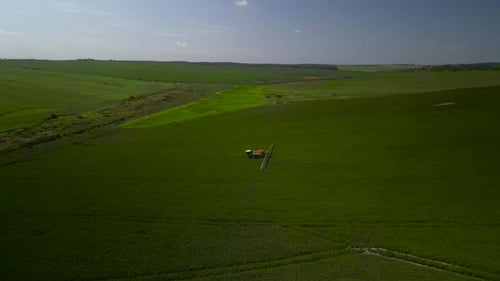 Spray Fertilize On Field With Chemicals In Agriculture Field