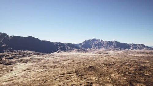 Sweeping Aerial View of Arid Mountainous Desert Landscape