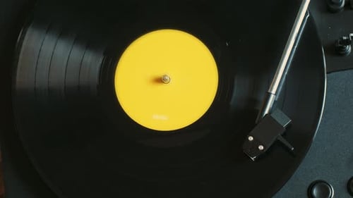 Record Spinning on a Turntable Overhead