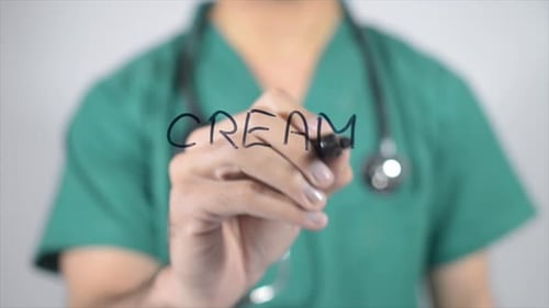 Doctor Writing Cream with Marker Close Up