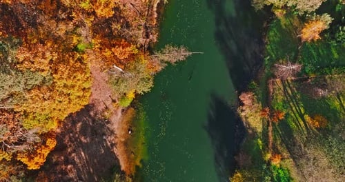 Aerial view of brda River and autumn colorful forest.