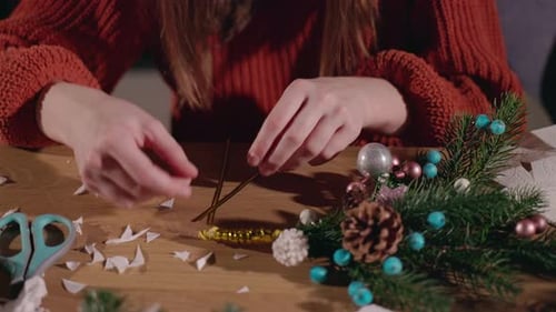 Child Crafts Christmas Decoration with Pine and Ornaments