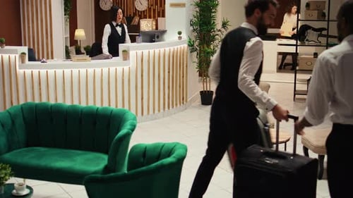 Hotel Lobby Check In At Reception Desk