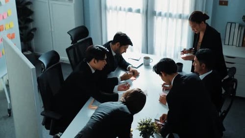 Top view of business people brainstorm idea by using sticky notes. Directorate.