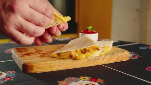 Close Up of Cheese Quesadilla Eating Traditional Mexican Food Tex Mex Cuisine