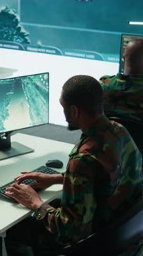 Vertical Video Military Experts in Mission Control Center Use Modern Technology on Computer