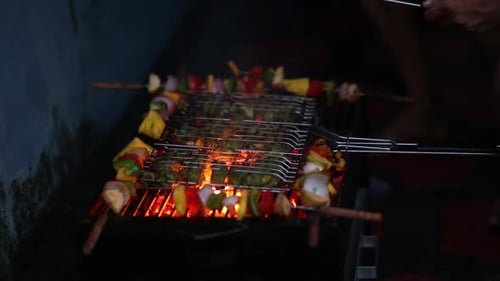 Grilling Skewers Over Open Fire