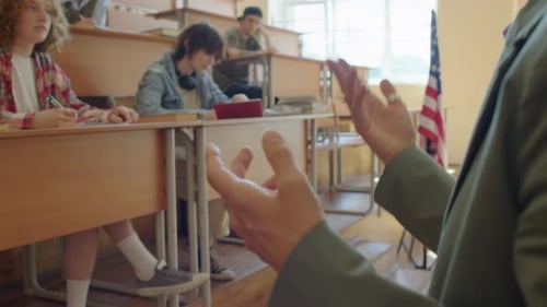 Unrecognizable Lecturer Working In College