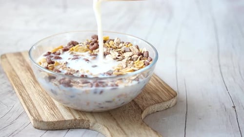 Delicious Cereal and Milk in a Clear Bowl