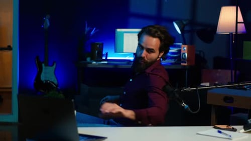 Childish Man Doing Creative Intro for Vlog Spinning on Chair While Filming