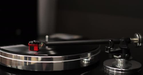 Classic Vinyl Record Player Closeup Retro Vinyl Record Player Spins an LP Disc Classic Vinyl Record