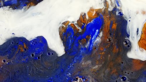 Abstract fluid art in vibrant blue, orange, and white tones creating a dynamic, marbled texture