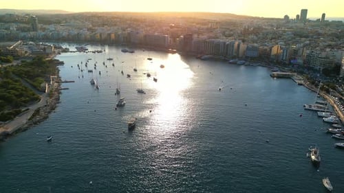 Aerial drone view of the walled city of Valletta, Malta, surrounded by the Mediterranean sea in dayl
