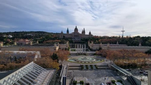 Aerial long view of Avinguda de la Reina Maria Cristina at its junction with Montjuic Palace
