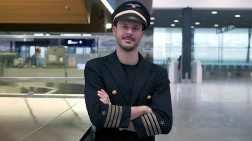 Portrait of Proffesional Male Pilot Captain Working in Aviation Business