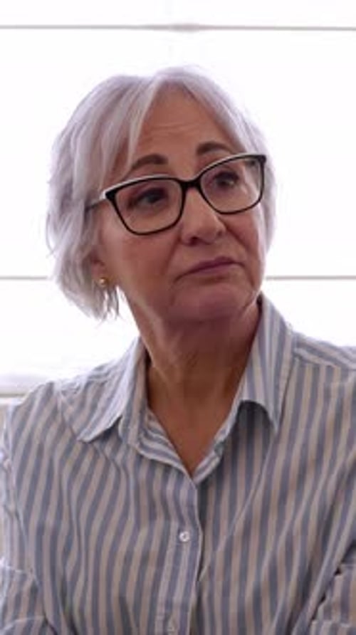 Group People Sitting in Circle Supporting Each Other at Community Center