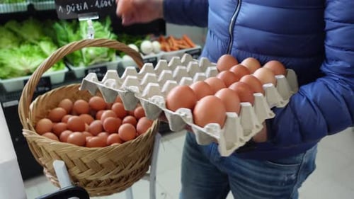 Brown eggs in the basket. Dietary products. Organic fresh eggs.
