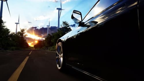 3D render of generic electric car drives on a Road with wind turbines in the background