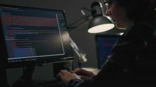 A Young Girl Programmer In The It Sphere Writes Code While In Her Home Office Working Remotely