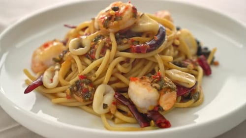 Close Up of Noodles with Seafood and Chilis