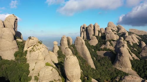 Aerial views of Montserrat peaks, a mountain range in Catalonia. Montserrat conglomerate crags