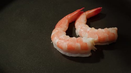 Shrimps are Fried in a Pan with Olive Oil and Spices Traditional Asian Mexican Thai Dish High