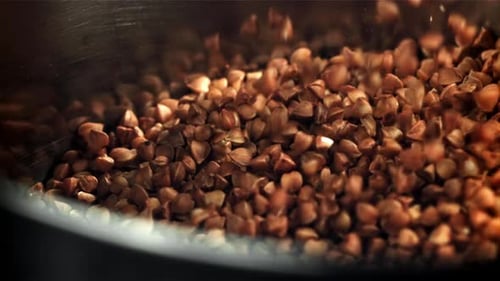 Buckwheat Falls Into the Pan Filmed on a Highspeed Camera at 1000 Fps