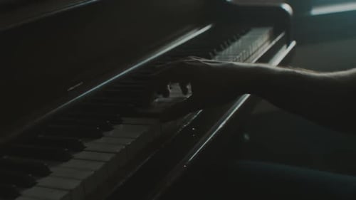 Close Up of Pianist Playing Piano