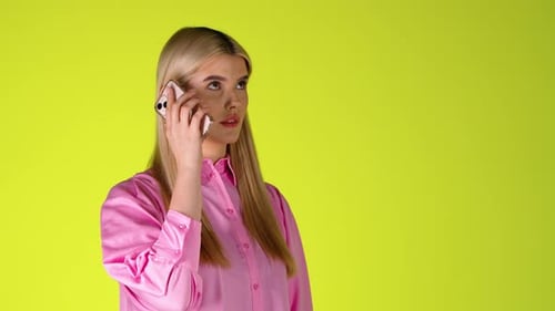 Blonde Woman Dialing On Cellphone To Make a Call and Remains Silent, Missed Call Studio Shot