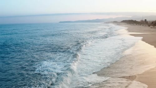 Rough Winter Ocean Waves Crashing on the Beach