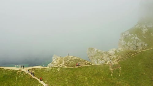 Tourists Explore Nature of Italian Alps Aerial View Seceda Mountain Range in the Summer