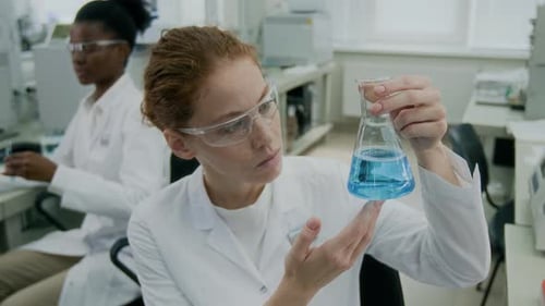 Scientists Working in a Bright Modern Lab Setting