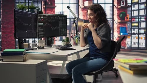 Pleased Trader Examines Financial Documentation on PC and Being Happy