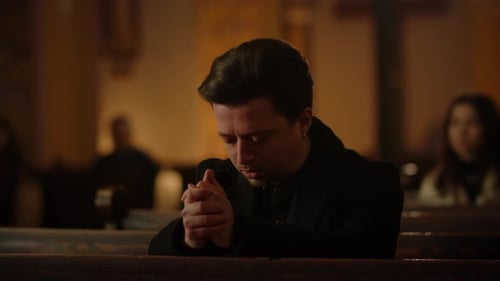Young Man Praying in Church Churchgoer Praising God During Sunday Service Religious Man Prays with