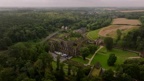 Villers Abbey Ruins are Revealed in an Aerial View Camera Pans Over the Abbey Showing the Layout of