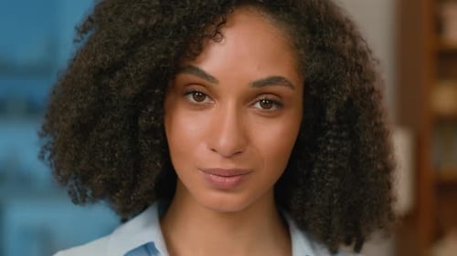Close Up Confident African American Woman Female Girl Looking at Camera Expression Face Ethnicity