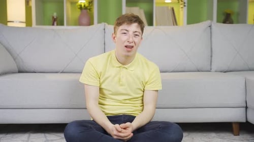 Young man frustrated, angry and thoughtful.