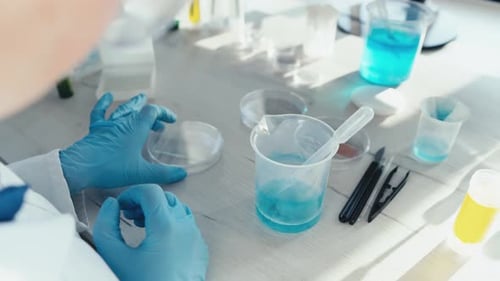 Lab Research With Petri Dishes And Beakers