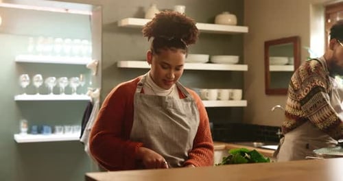 Loving Couple Prepares Food Together in Kitchen
