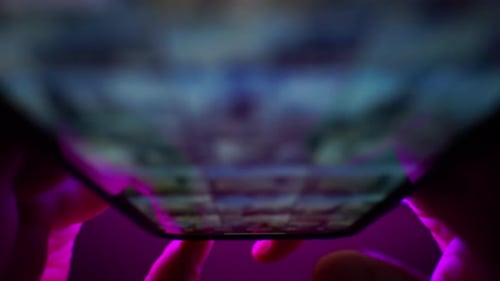 Fingers touching and scrolling on mobile application