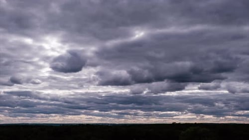 Dramatic Storm Clouds Moving in the Sky Over Horizon Cloud Space Timelapse