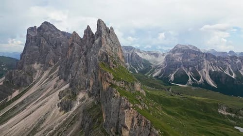 Aerial view of jagged mountain peaks in Dolomites, Italy.