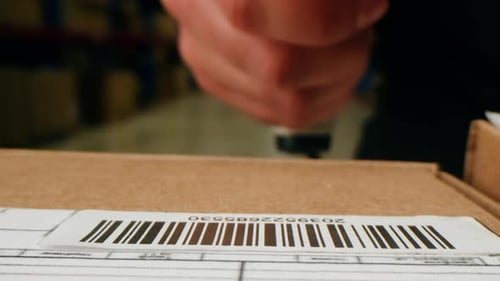 Scanner Scan Delivery Box in Storage Ecommerce Shop Man Packing Goods and Clothes Second Hand